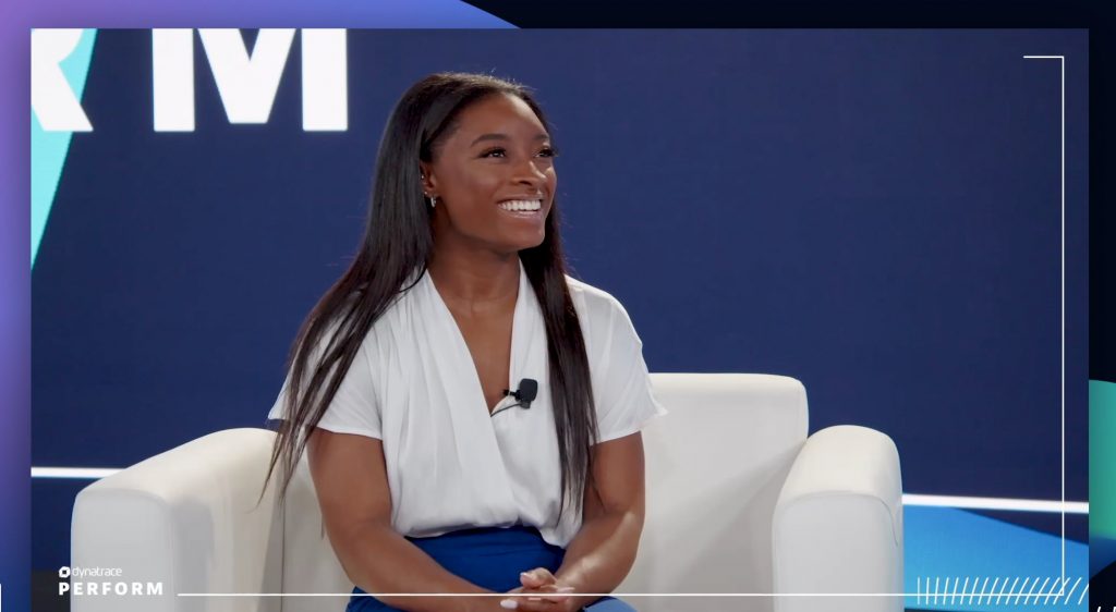 Simone Biles flashes her twinkly smile